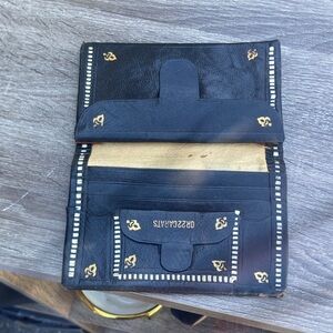 Vintage hand rolled and stitched real soft leather Black and Gold Wallet